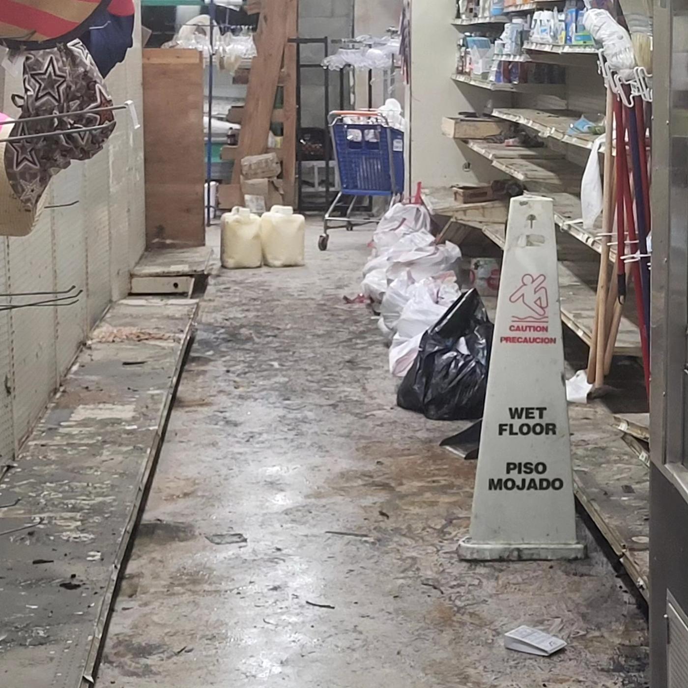 Inside the Cedar Key Market after Hurricane Helene: mud and damage on the floors and shelves